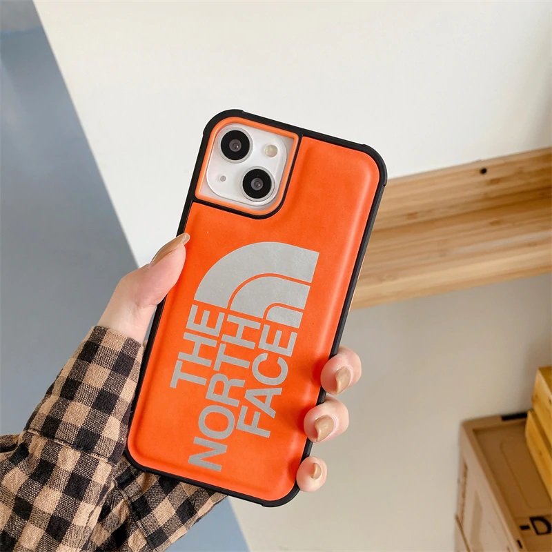 Кожаный чехол для iPhone 13 The North Face с защитой на бортиках Оранжевый
